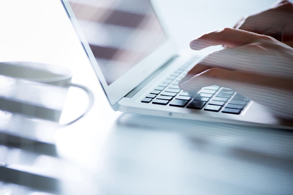 A client using the Harmony platform on a laptop.